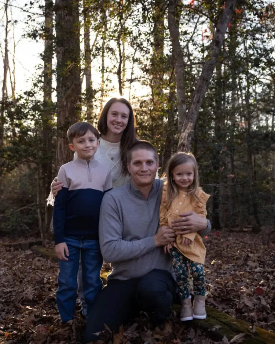 Owner Heaven Klotzle with her husband and two children outdoors